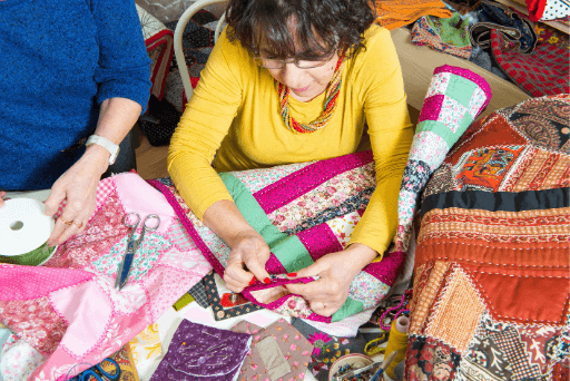 women quilting quilting bee