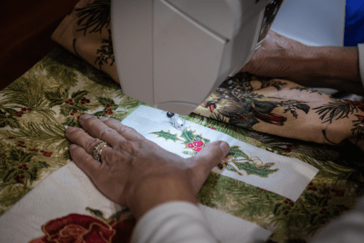 woman using sewing machine quotes about quilting